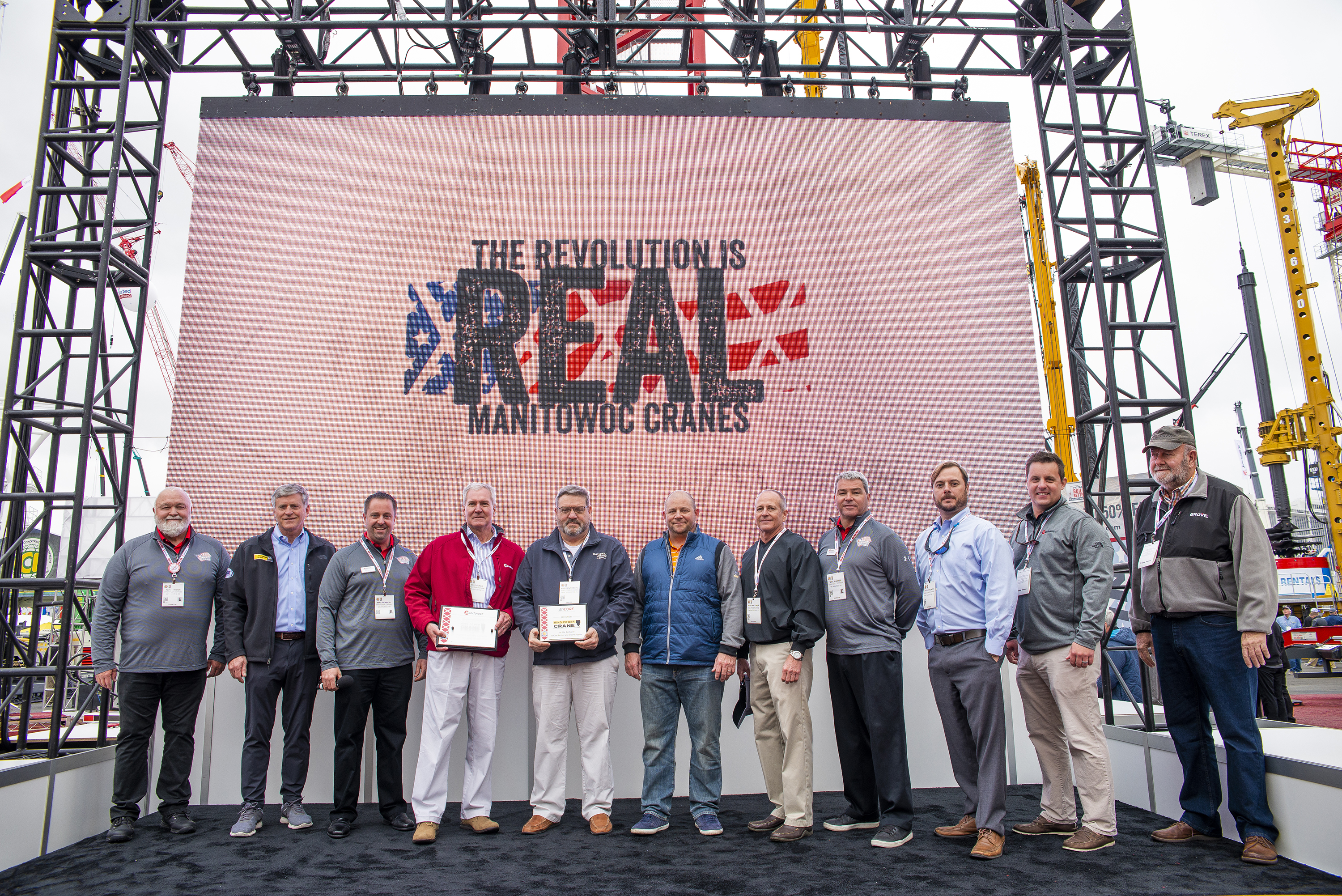 Ring Power Corporation President David Alban, Executive Vice President Kevin Robbins and Vice President/General Manager of Ring Power Crane Dave Glass received the award at the Manitowoc booth. Manitowoc’s Keith Crider and Mike Herbert presented them with celebratory plaques to mark the occasion, kicking off what has already been a fruitful CONEXPO for Manitowoc.
